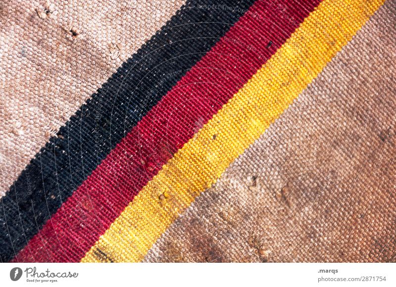 Flag on mailbag Logistics Services Mail German Flag Cloth Old Dirty Brown Yellow Red Black Politics and state Colour photo Exterior shot Detail