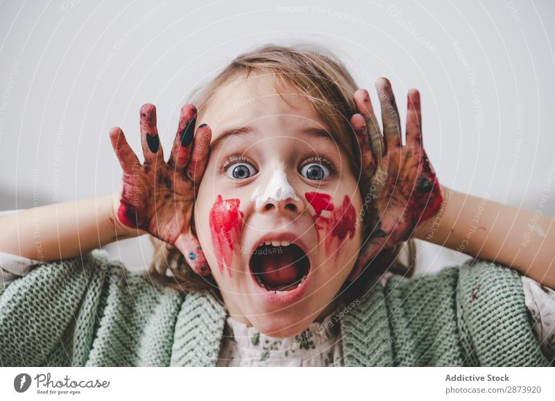 Girl with dirty hands coloring face Hand Dirty Colouring Face Painting (action, artwork) Funny Child Decoration Multicoloured Bright Woman Infancy Preparation