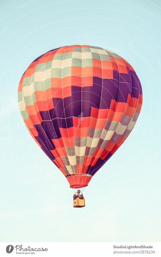 Red and purple hot air balloon Joy Leisure and hobbies Vacation & Travel Adventure Freedom Sports Sky Transport Aircraft Hot Air Balloon Old Flying Faded Bright