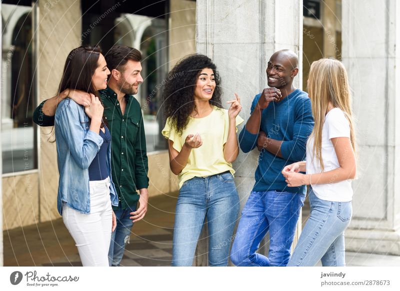 Multi-ethnic group of young people having fun together outdoors in urban background Lifestyle Joy Happy Beautiful Summer Human being Masculine Feminine