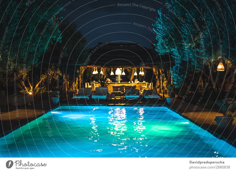 Swimming pool by night poolside Beautiful Landscape Relaxation Bar Vacation & Travel Summer Resort Lifestyle Luxury Lighting Night Exterior shot Twilight