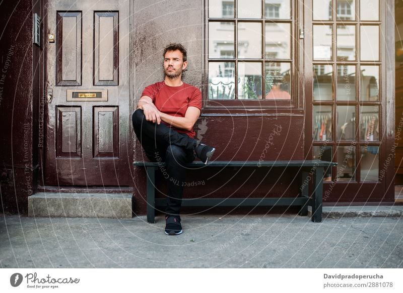 Man sitting in a bench on a beautiful maroon background Caucasian Building Youth (Young adults) Architecture Vintage Notting Hill decor Street Sit Summer