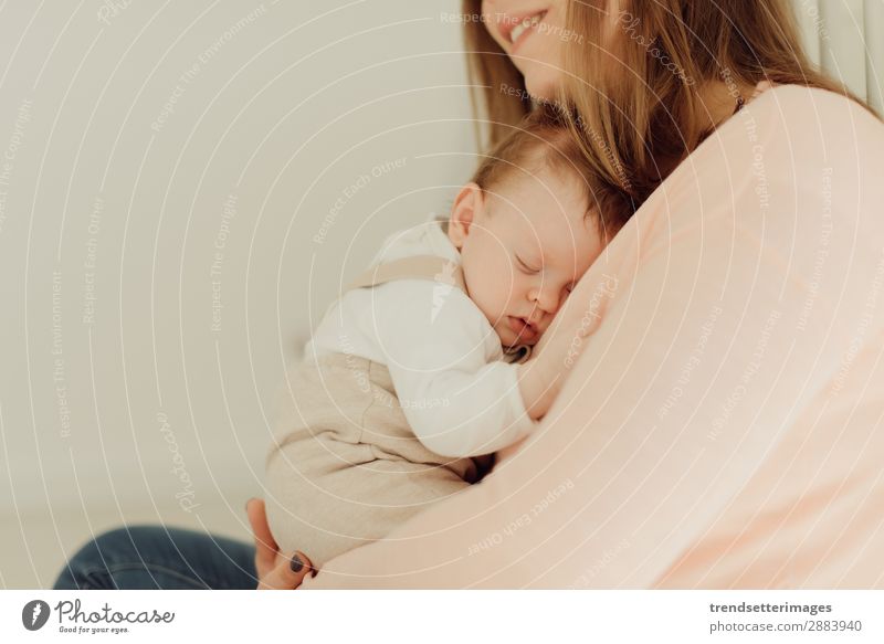 Young Mother holding newborn baby Eating Happy Beautiful Child Baby Woman Adults Parents Family & Relations Infancy Arm Feeding Love Small White Protection