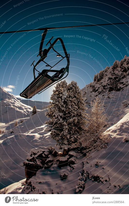 Chairlift/Íschgl Nature Sky Cloudless sky Sun Winter Snow Cool (slang) Free Fresh Blue Multicoloured Black White Adventure Loneliness Energy Stagnating