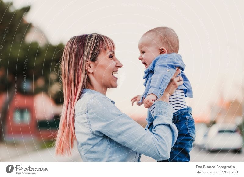 young beautiful mother holding baby boy Lifestyle Joy Happy Beautiful Playing Summer Parenting Child Feminine Baby Boy (child) Woman Adults Parents Mother