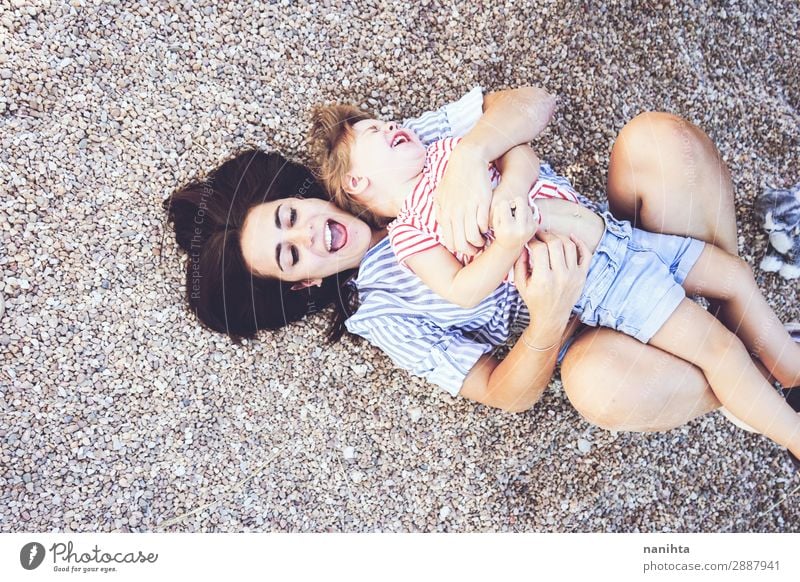 Mom and daughter having fun together in a park Lifestyle Joy Playing Summer Parenting Child Human being Feminine Toddler Woman Adults Mother Family & Relations