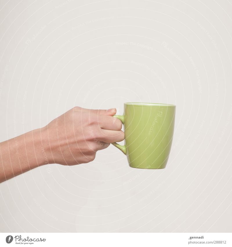 Here you go. Breakfast To have a coffee Beverage Drinking Hot drink Hot Chocolate Coffee Tea Arm Hand Warmth Green Square Calm Placed Neutral Give To hold on