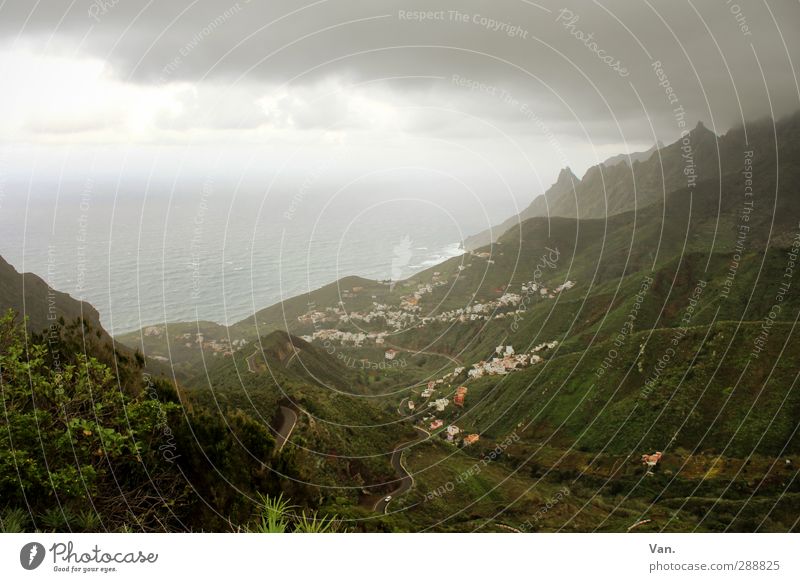 bad weather front Vacation & Travel Nature Landscape Sky Clouds Horizon Bad weather Grass Bushes Hill Mountain Coast Ocean Atlantic Ocean Tenerife Village Cold