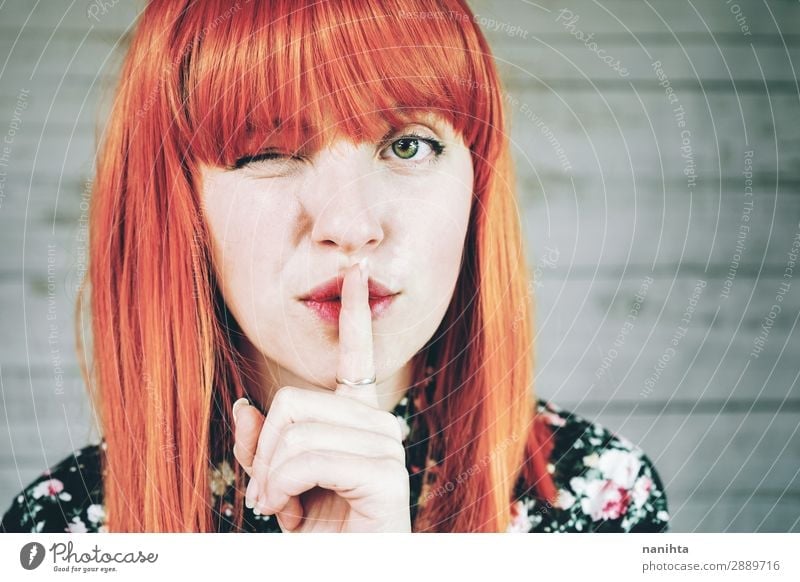 Young redhead woman doing a silent gesture Lifestyle Style Beautiful Hair and hairstyles Skin Face Calm Human being Feminine Young woman Youth (Young adults)