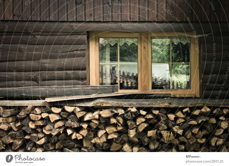 Tidy wood Village Wall (barrier) Wall (building) Facade Balcony Window Brown Wood Firewood Hut Chalet vacation Reflection Fuel Glass Farm Old Subdued colour