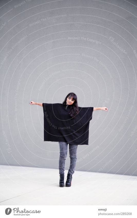 Q = Square Feminine Young woman Youth (Young adults) 1 Human being 18 - 30 years Adults Fashion Clothing Hip & trendy Gray Black Cape Colour photo