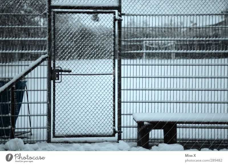 winter Sporting Complex Football pitch Racecourse Winter Snow Cold Gloomy Gray Door Metalware Wire netting fence Subdued colour Exterior shot Pattern Deserted