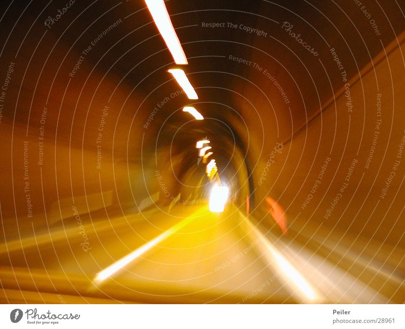 Speed in the tunnel Tunnel Light Long exposure Yellow Tunnel vision Reaction Orange