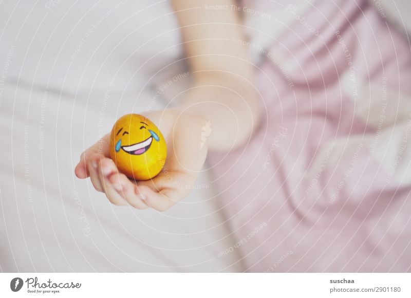 Easter approaches ... Easter egg Egg Painted Smiley Laughter Joke Funny Youth (Young adults) Young woman Child Bed Bedclothes Comfortable Fatigue Illness