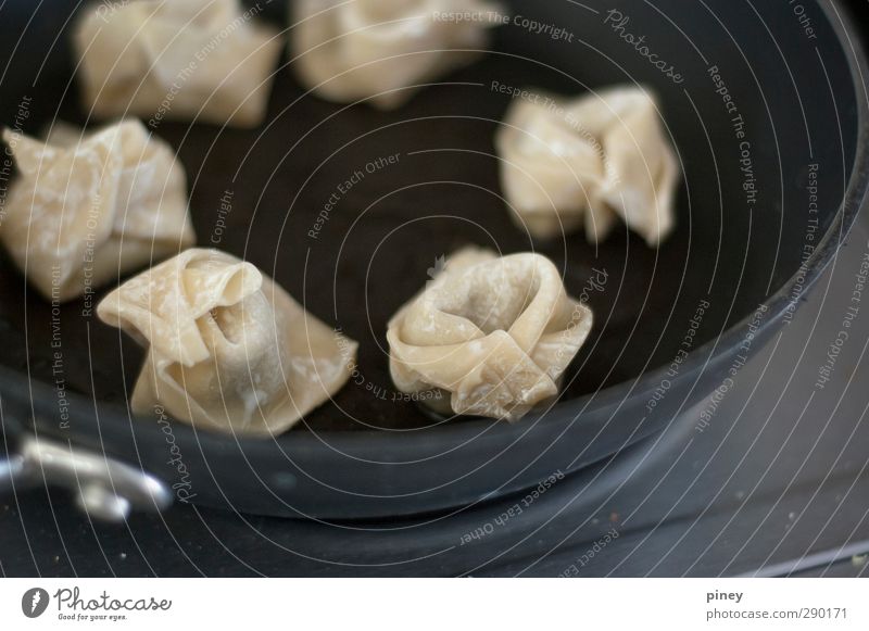 wontons Food Dough Baked goods Asian Food dumpling edamame Pan Healthy Near Black folded uncooked cooking frying oil Subdued colour Interior shot Close-up