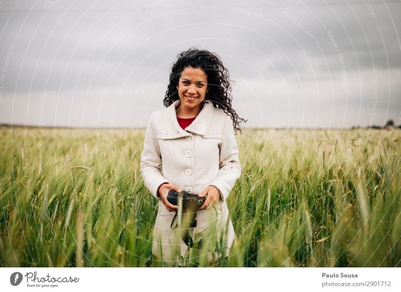 Girl with camera smiling in fields Lifestyle Photography Photographer Vacation & Travel Spring Camera Young woman Youth (Young adults) Woman Adults 1