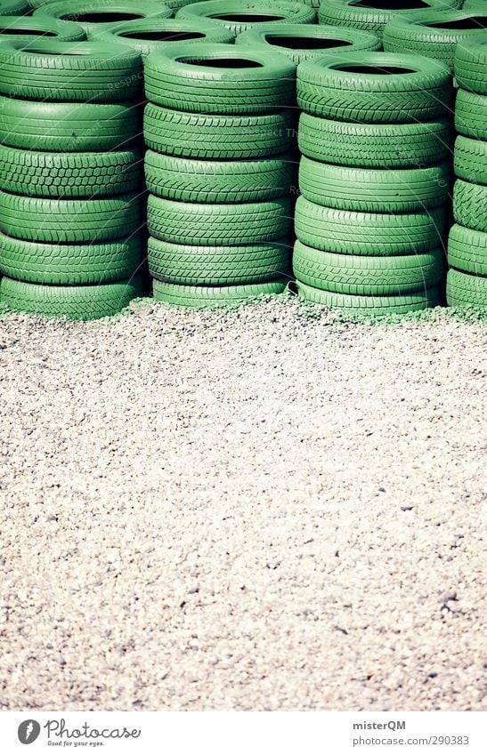 Tire pile. Transport Esthetic Racecourse Racing sports Accident Safety Stack Speed Speed rush Green Formula 1 Gravel Pebble Gravel bed Colour photo