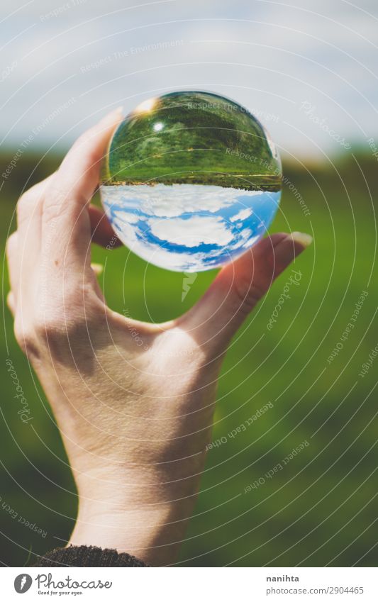 green field viewed through a crystal ball Design Harmonious Hand Environment Nature Landscape Sky Spring Summer Beautiful weather Grass Field Simple Free Fresh