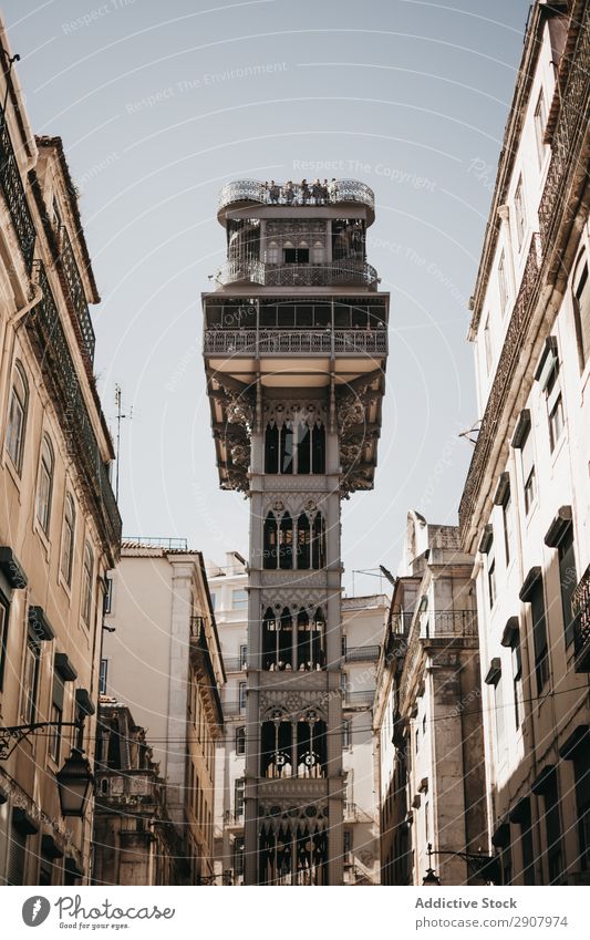 Beautiful tower on city street Tower Street City Old Ornament Architecture Lisbon Portugal Sky Beautiful weather Sunbeam Day Tourism Vacation & Travel Trip