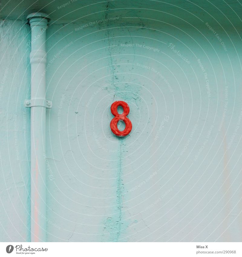 8 Sign Characters Signs and labeling Red Light blue House number Wall (building) Wall (barrier) Conduit Colour photo Multicoloured Exterior shot Deserted