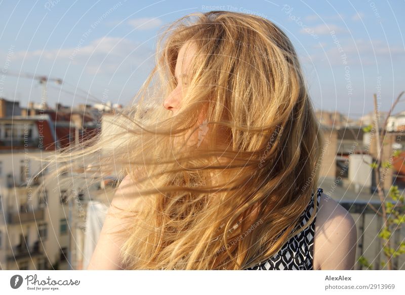 Blond girl with blowing hair on roof terrace Elegant Style Beautiful Hair and hairstyles Wellness Life House (Residential Structure) Young woman