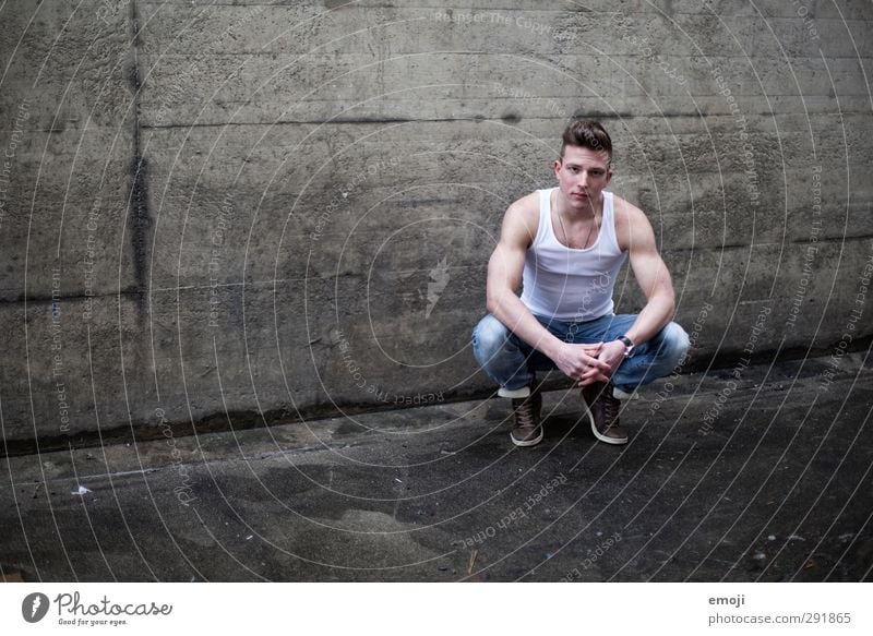 dark grey Masculine Young man Youth (Young adults) 1 Human being 18 - 30 years Adults Wall (barrier) Wall (building) Beautiful Muscular Concrete Sports top