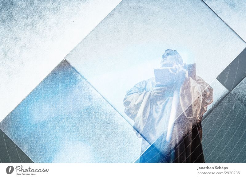 Martin Luther statue double exposure with paper 500 Reform Orientation Religion and faith anger Christianity Erfurt Protestantism God Jubilee Winter Sun Statue