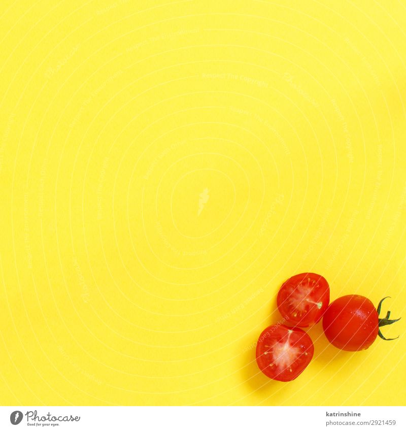 Cherry tomatoes on a yellow background Vegetable Vegetarian diet Diet Fresh Bright Above Yellow Red cherry tomatoes Ingredients Raw Minimalistic Copy Space