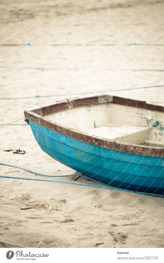 nut shell Environment Nature Sand Means of transport Boating trip Fishing boat Rowboat Harbour Wood Old Authentic Bright Dry Blue Turquoise Empty Rope