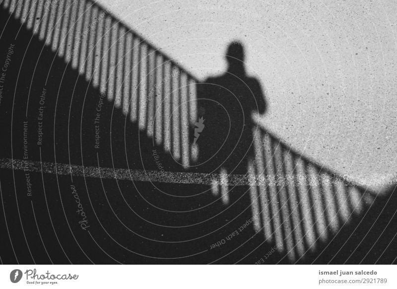 man shadow silhouette on the ground Silhouette Human being Man Shadow Light Sun Sunlight Street Ground Exterior shot City Abstract Minimal Neutral Background