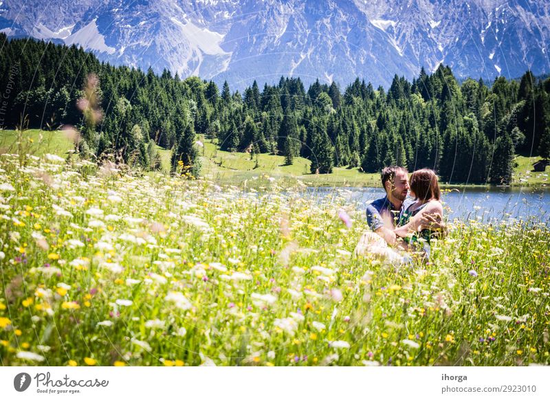 happy lovers on Holiday in the alps mountains Lifestyle Beautiful Relaxation Vacation & Travel Adventure Summer Mountain Human being Woman Adults Man Couple
