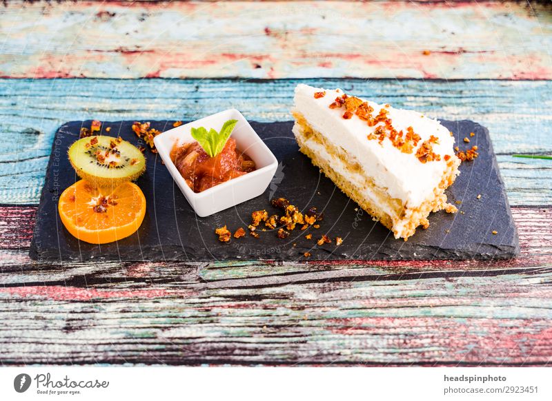 Vegan coconut cake with brittle, plums & fruit Food Fruit Cake Dessert To have a coffee Slow food Multicoloured Turquoise Slate Modern Wooden table Gateau