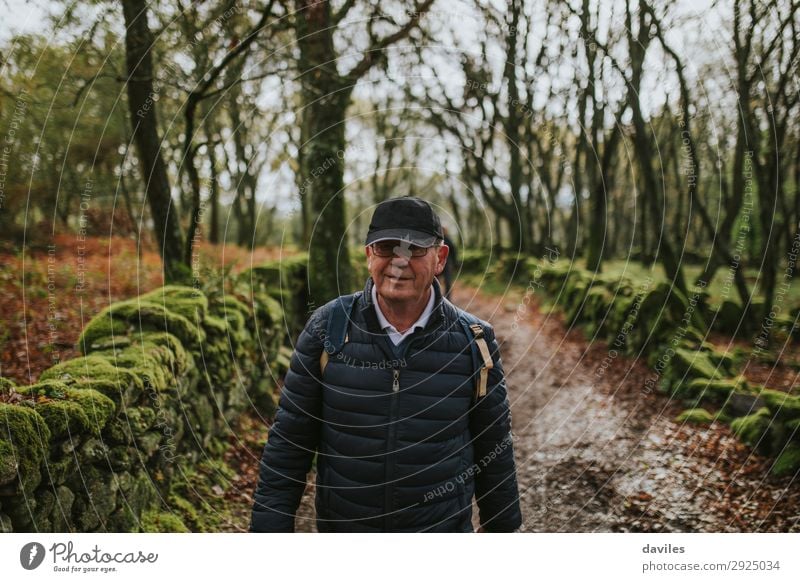 Happy senior man hiking in nature. Vacation & Travel Adventure Hiking Human being Man Adults Male senior 1 60 years and older Senior citizen Nature Landscape
