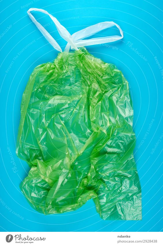 empty green plastic garbage bag with handles Environment Container Package Plastic Utilize New Clean Blue Green White Colour Environmental pollution bin