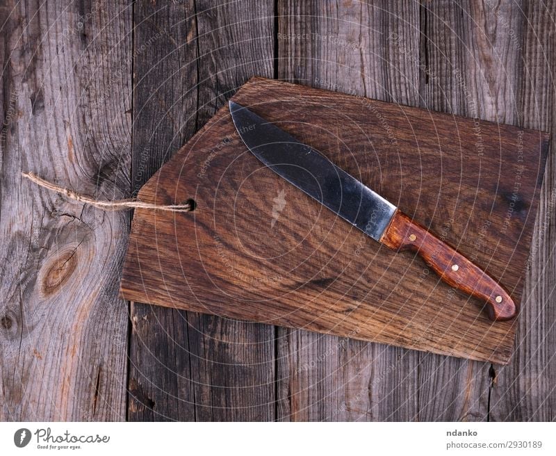 empty old brown wooden cutting board and knife Knives Table Kitchen Tool Nature Wood Metal Steel Old Retro Brown Chopping board blade Blank chopping cook