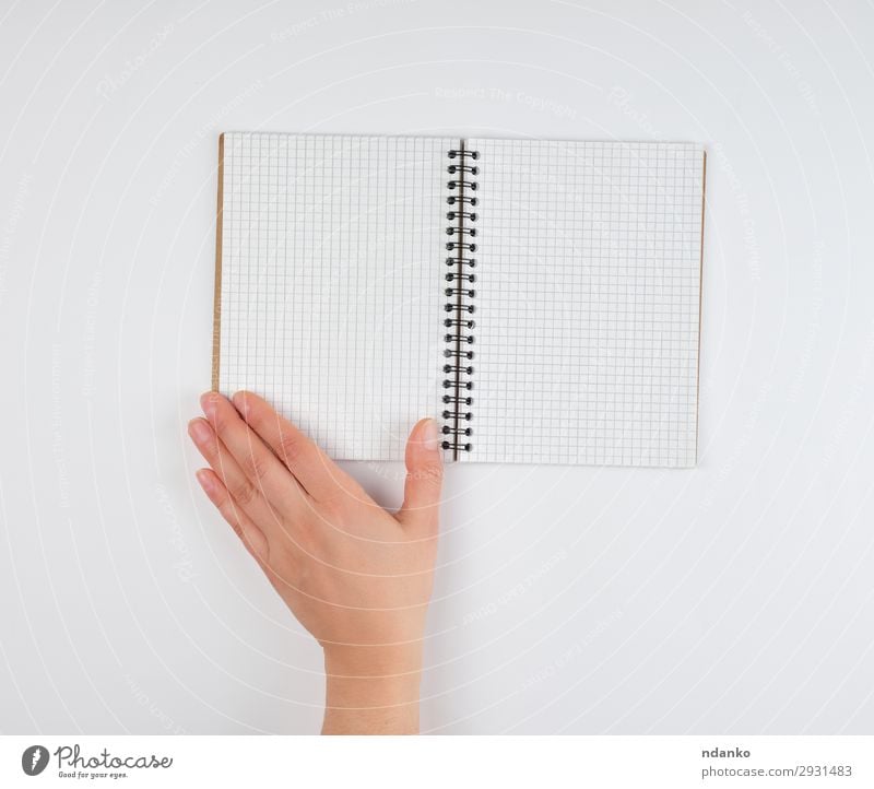 empty open notebook in a cell and a female hand School Study Office Business Human being Woman Adults Arm Hand Fingers Book Paper Write White background Blank