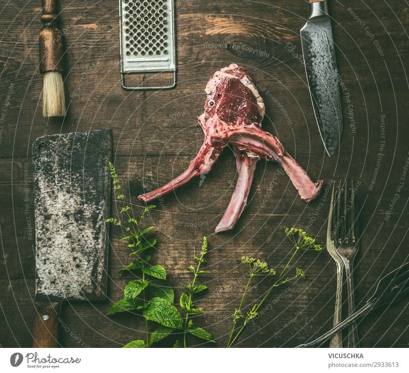 Raw lamb racks meat with fresh herbs Food Meat Herbs and spices Nutrition Crockery Style Design Table Restaurant Barbecue (apparatus) Lamb Racks Lamb chop