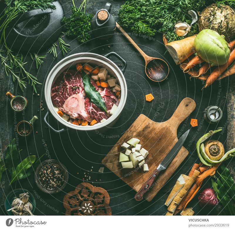 Preparing beef broth or soup Food Meat Vegetable Soup Stew Herbs and spices Nutrition Organic produce Vegetarian diet Diet Slow food Crockery Pot Knives Spoon