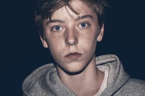 Night shot of a teenager Lifestyle Calm Human being Masculine Boy (child) Young man Youth (Young adults) Face 1 13 - 18 years Hooded sweater Simple already