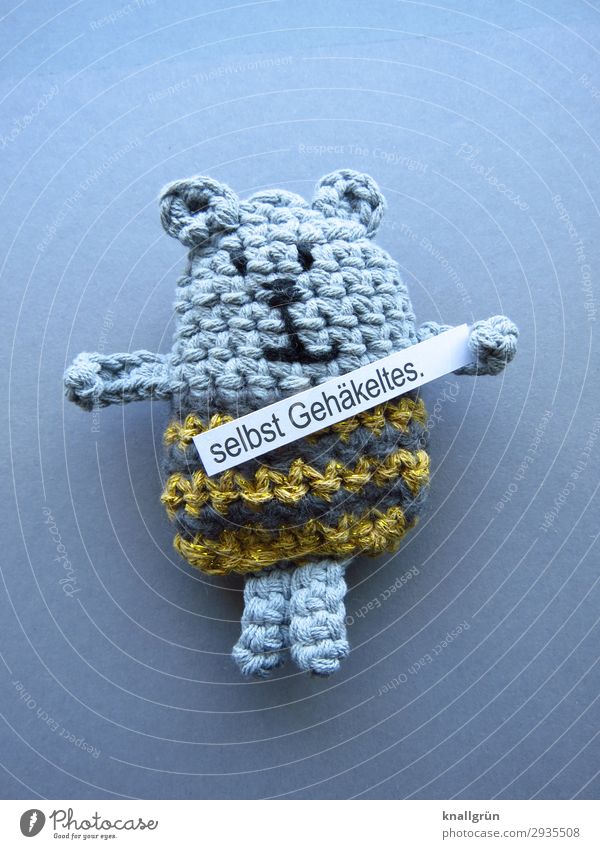 even crocheted. Characters Signs and labeling Communicate Cute Gold Gray Violet Leisure and hobbies Creativity Self-made Crochet Bear Cuddly toy Colour photo