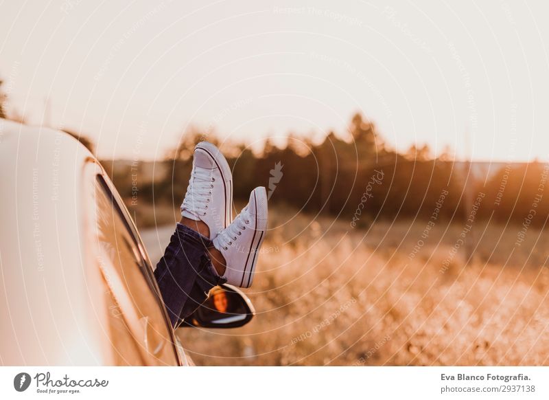 Modern hipster girl resting in a car and admiring view Lifestyle Joy Relaxation Vacation & Travel Trip Adventure Summer Sun Young man Youth (Young adults) Woman