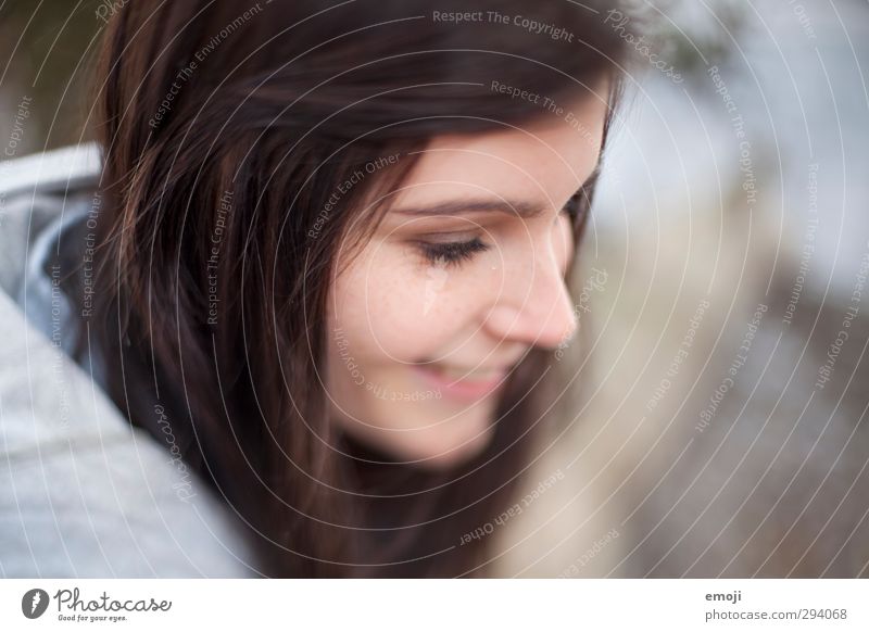 shy smile Feminine Young woman Youth (Young adults) Head Face 1 Human being 18 - 30 years Adults Beautiful Smiling Sheepish Colour photo Exterior shot Day Blur
