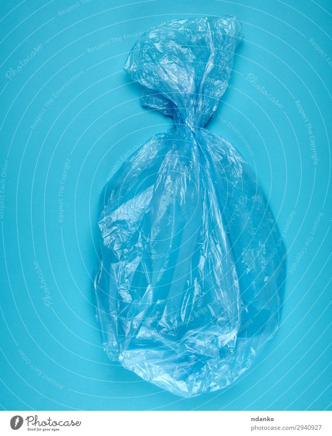 blue plastic bag for garbage on a blue background Environment Package Sack Plastic New Clean Blue Colour Environmental pollution bin Conceptual design