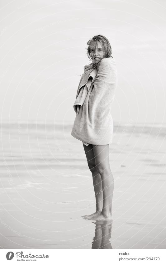 Cold on the beach Summer Summer vacation Beach Human being Young woman Youth (Young adults) 1 Blonde Beautiful Wrap up warm Black & white photo Interior shot