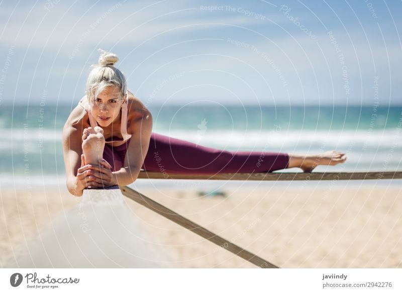 Caucasian woman practicing yoga at seashore. Lifestyle Beautiful Body Harmonious Relaxation Meditation Summer Beach Ocean Sports Yoga Human being Feminine