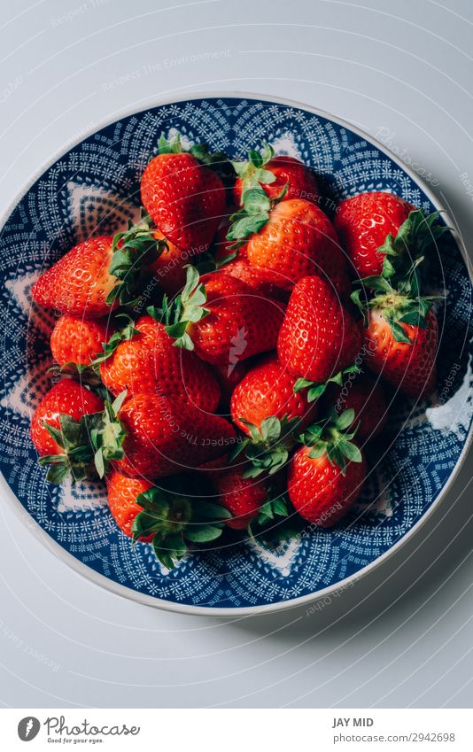 Fresh ripe strawberries in a blue and white plate Fruit Dessert Nutrition Breakfast Lunch Dinner Organic produce Vegetarian diet Plate Bowl Summer Table