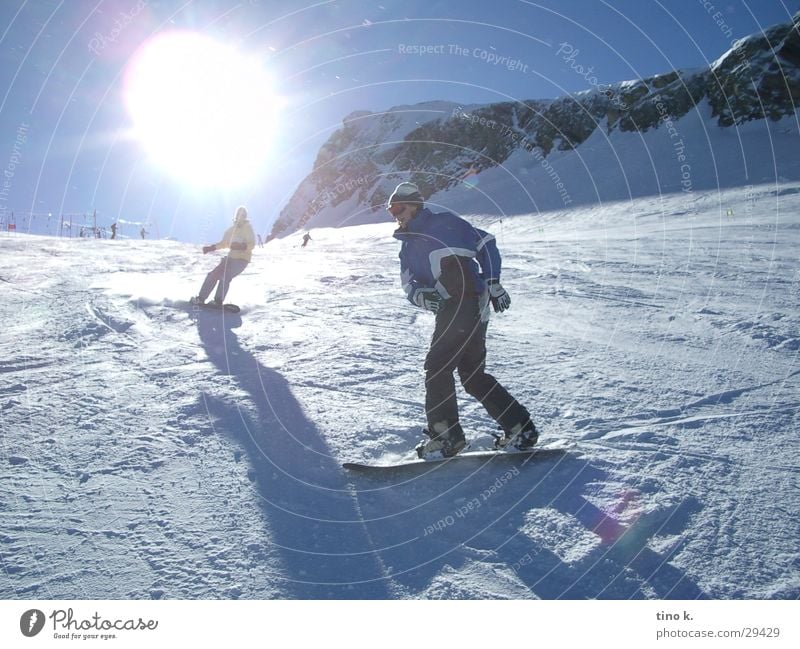 Kaprun@Noon Snowboard Back-light Glacier Kitzsteinhorn Sports Sun Downward Snowboarder Snowboarding 2 Curve Swing Spirited Alps Ski run Exterior shot