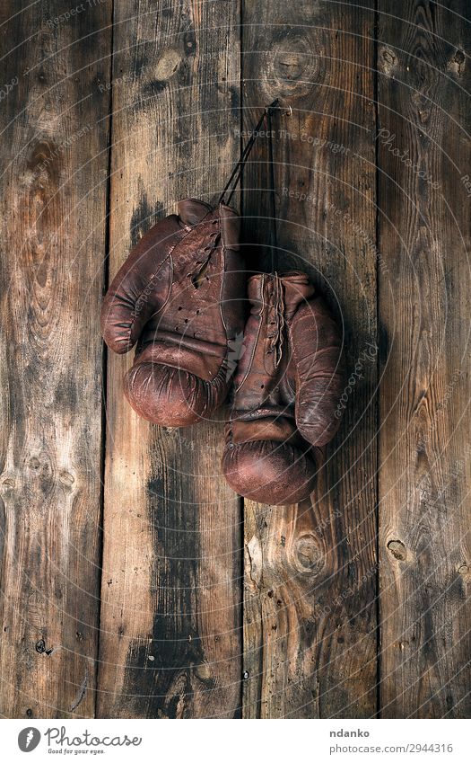 very old leather brown boxing gloves hang Lifestyle Sports Rope Leather Gloves Wood Old Fitness Hang Dirty Retro Brown Protection Competition Action Ancient