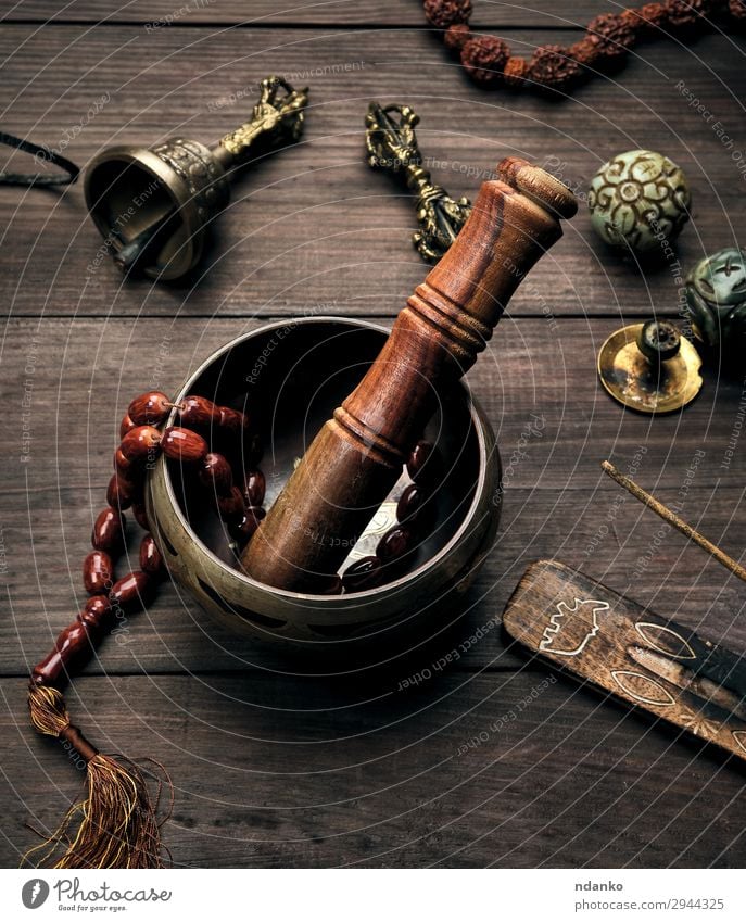 copper singing bowl and a wooden stick Bowl Lifestyle Health care Medical treatment Alternative medicine Wellness Relaxation Meditation Massage Table Music Yoga