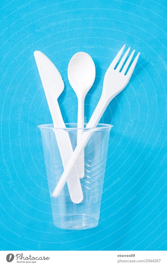 https://www.photocase.com/photos/2944367-disposable-plastic-cutlery-on-blue-background-top-view-photocase-stock-photo-large.jpeg